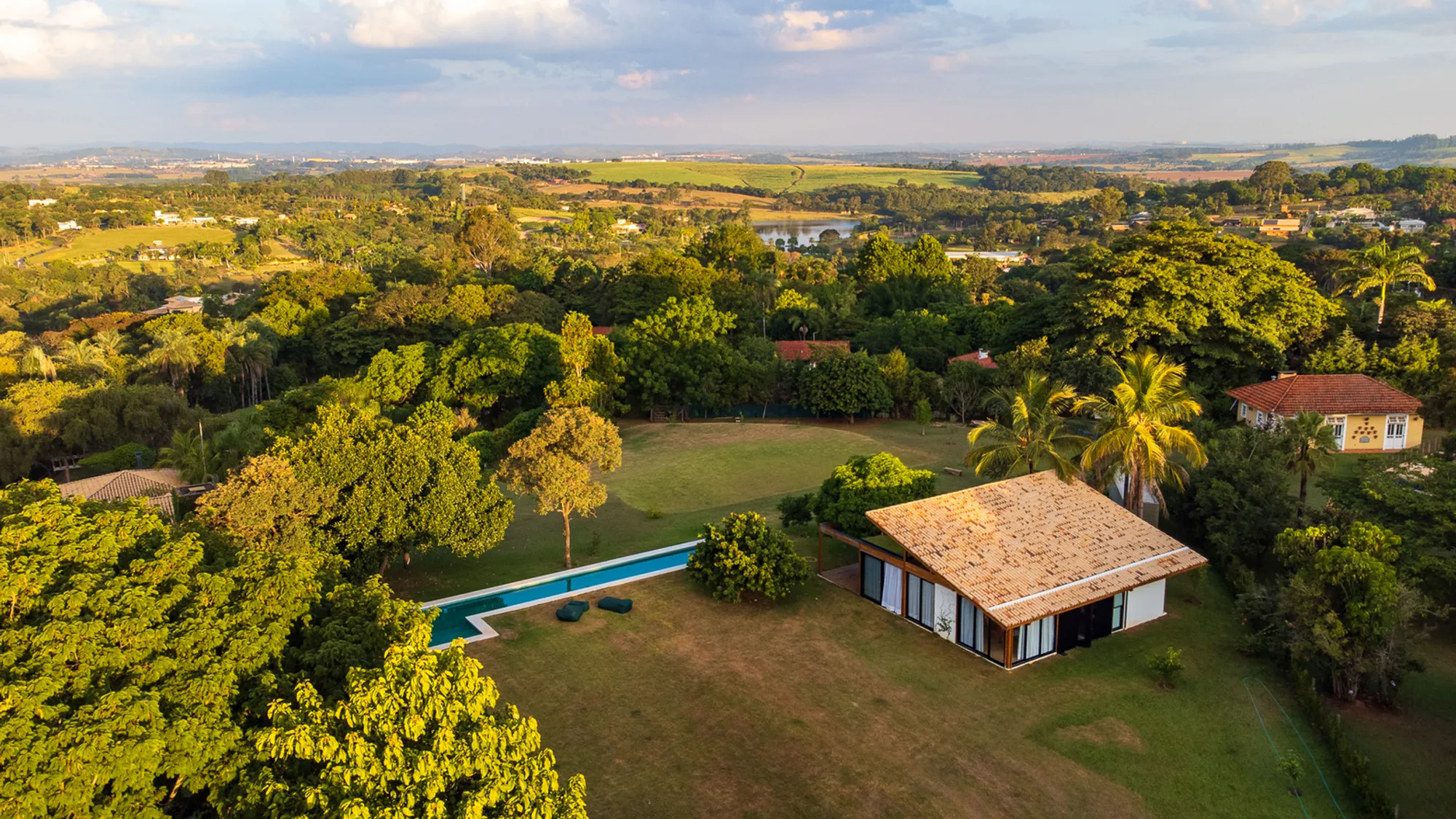 24 7 Arquitetura Builds a Timber Pavilion as a Family's First Act on a 5,000 m² Brazilian Plot