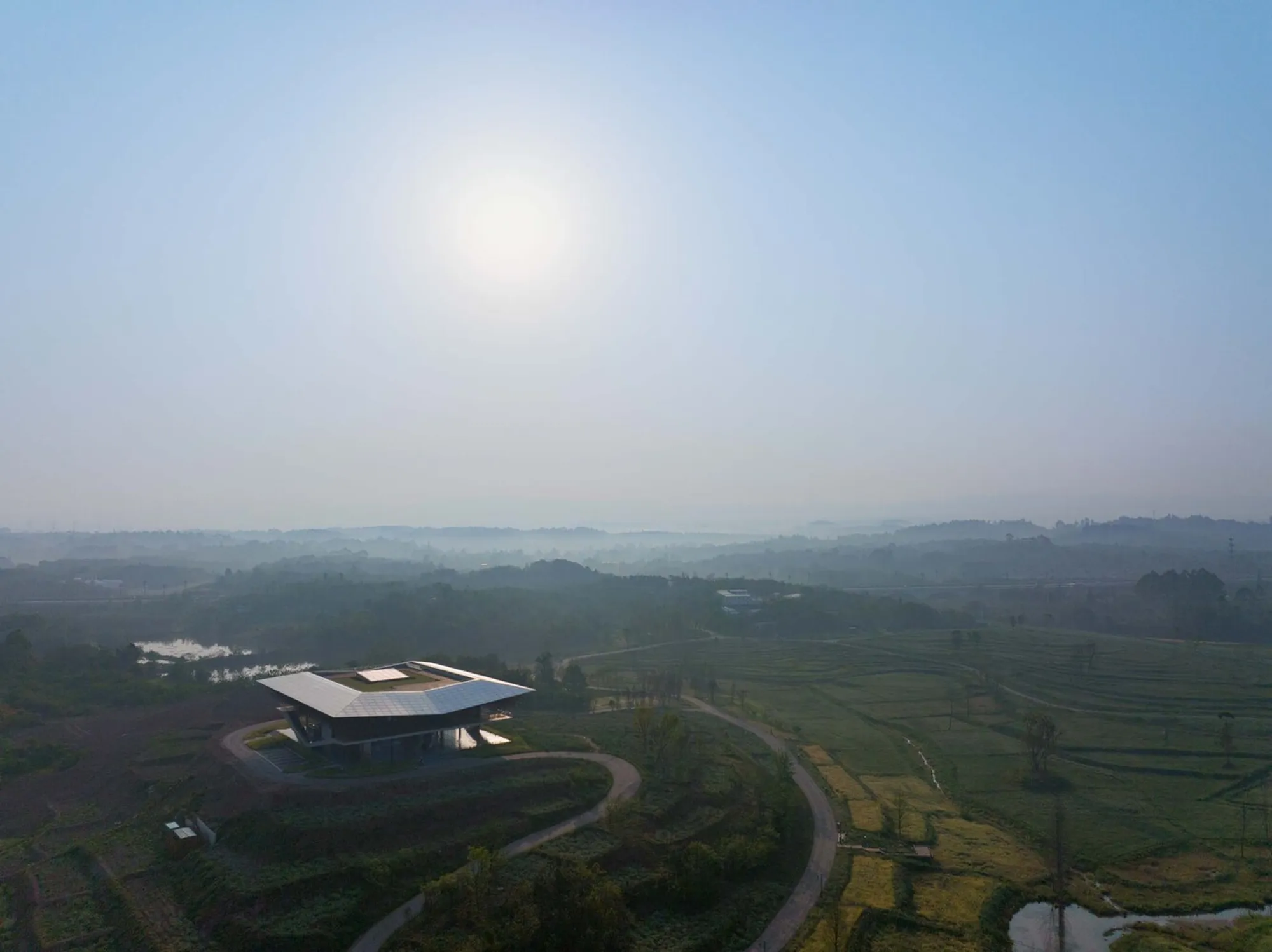 Chengdu Tianfu City Planning Hall by AND Studio: A Feathered Landmark in the Wetlands of Tianfu New Area