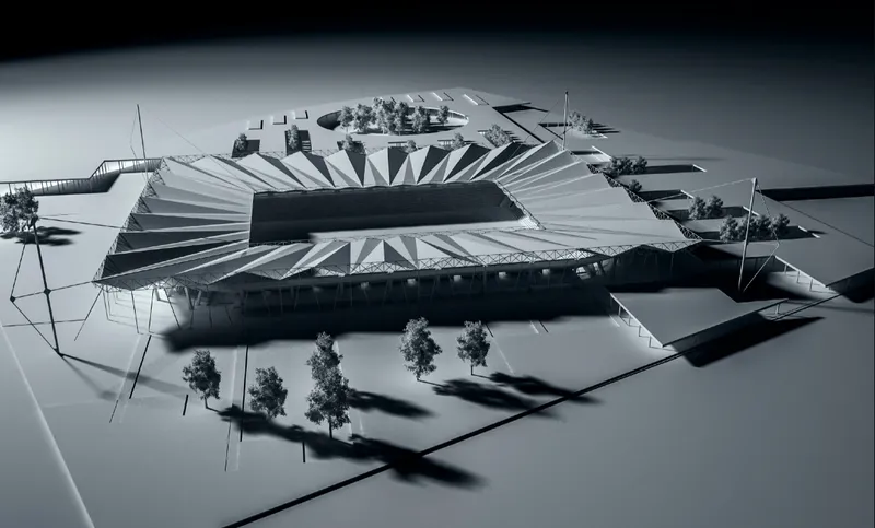 Aerial view of the physical model revealing the radial roof structure and perimeter ramps under shadow
