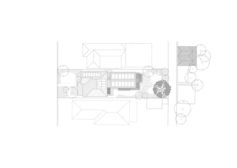 Site plan drawing showing a residence with a pool and surrounding trees