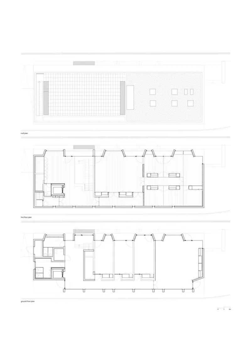 Plan drawings showing roof, first floor, and ground floor layouts of a rectangular structure with angled supports