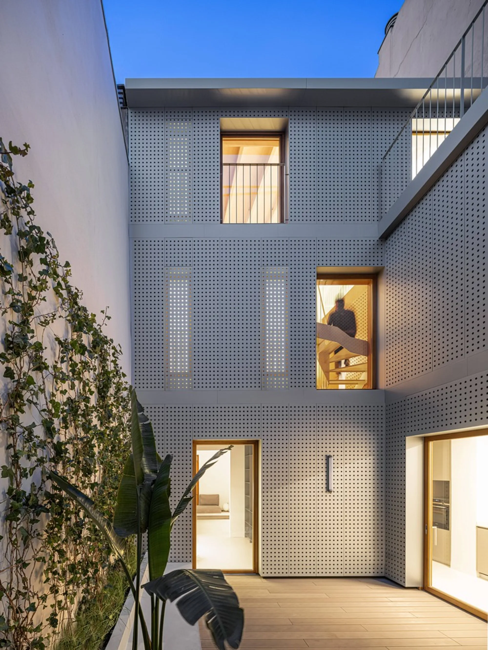 SOLAR Restores a Rare 19th-Century Madrid Moderno House with Two Contrasting Facades