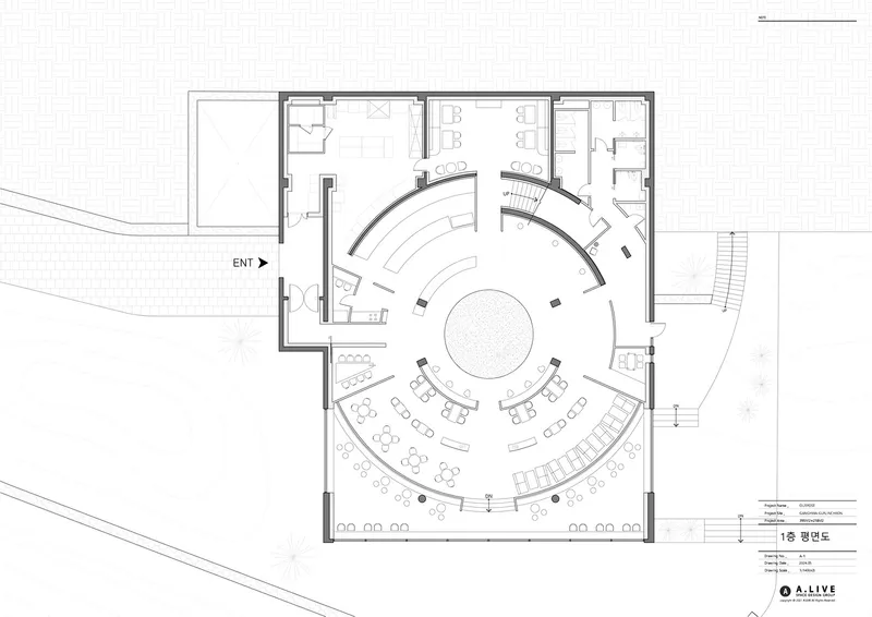 Floor plan drawing showing circular central space with radiating seating tiers and service rooms