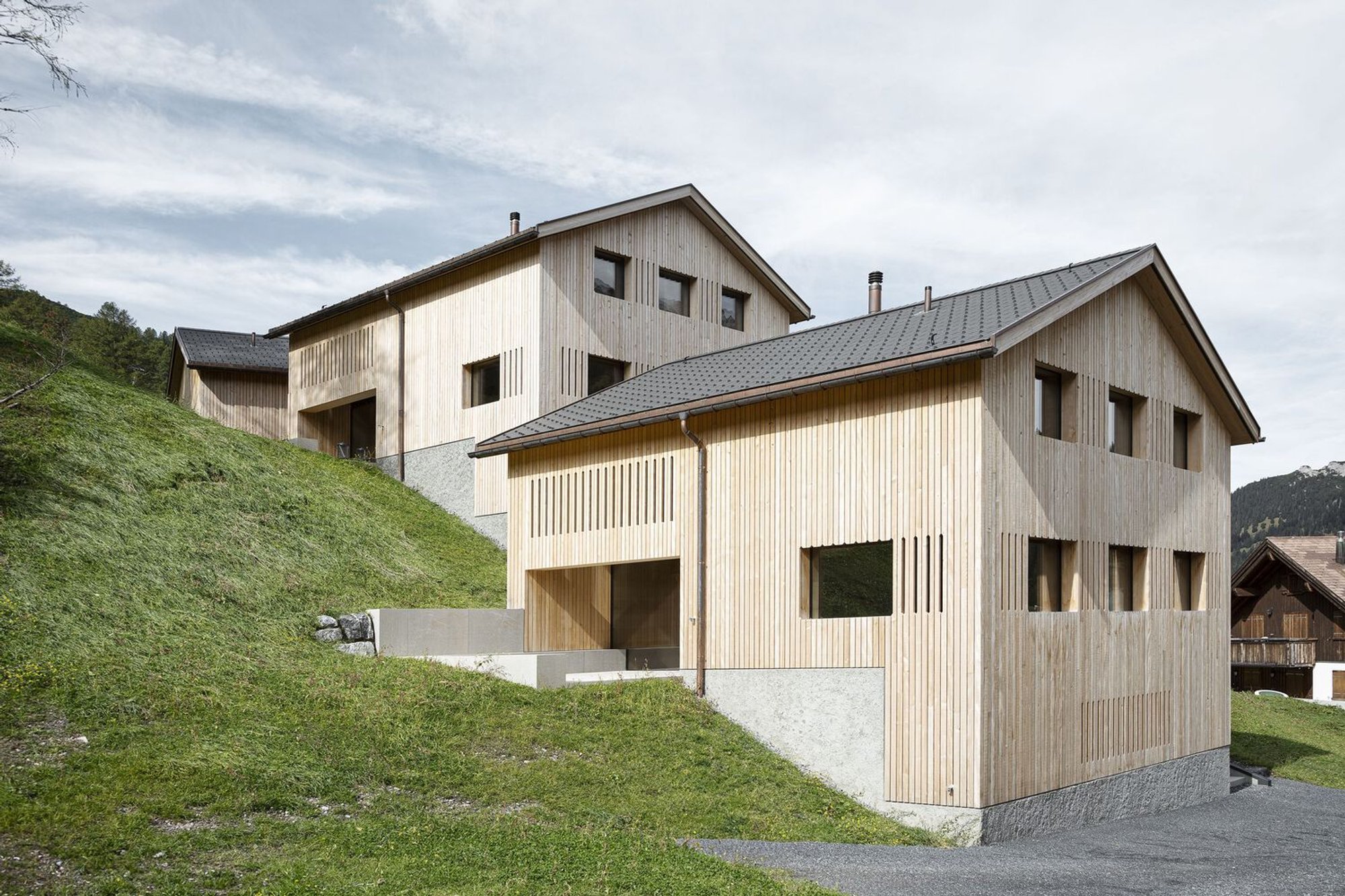 Sandro Durrer Reimagines the Alpine Hut as Three Timber Houses on a Liechtenstein Ski Slope