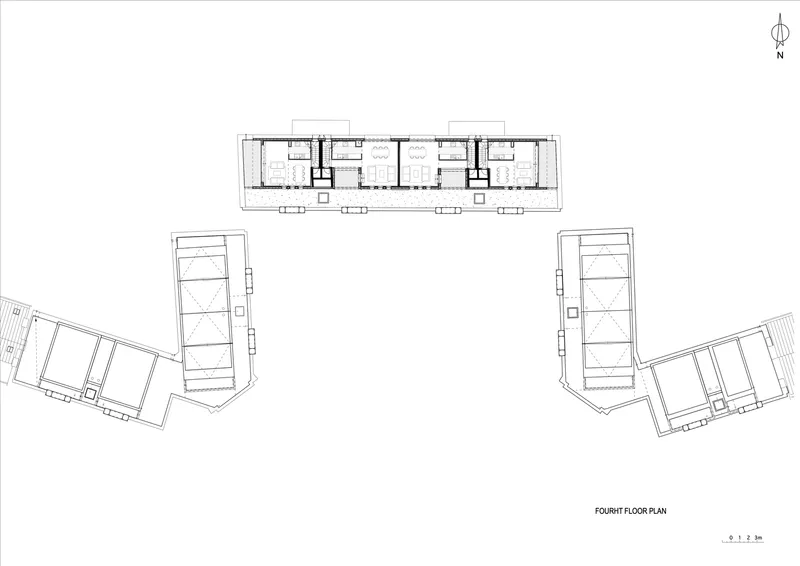 Fourth floor plan drawing showing courtyard units in the center bar and angled blocks at the edges
