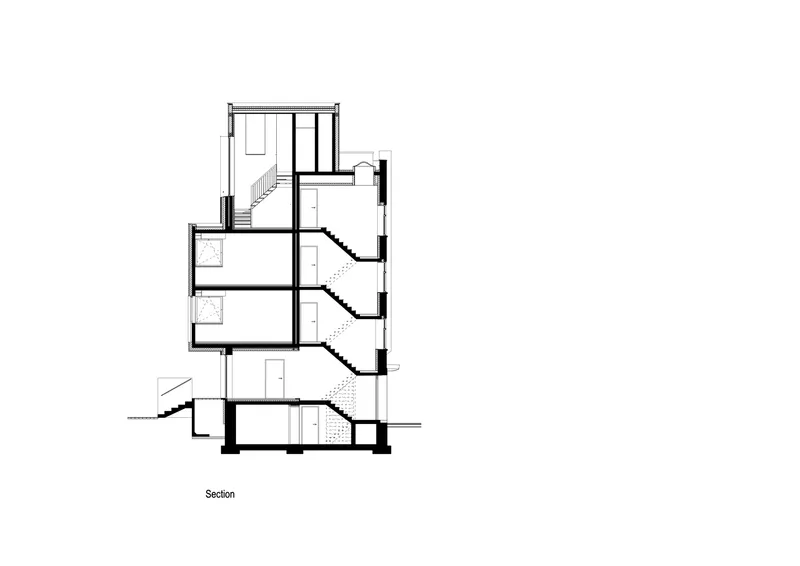 Section drawing revealing multi-level circulation with stairs connecting four residential floors and a rooftop volume