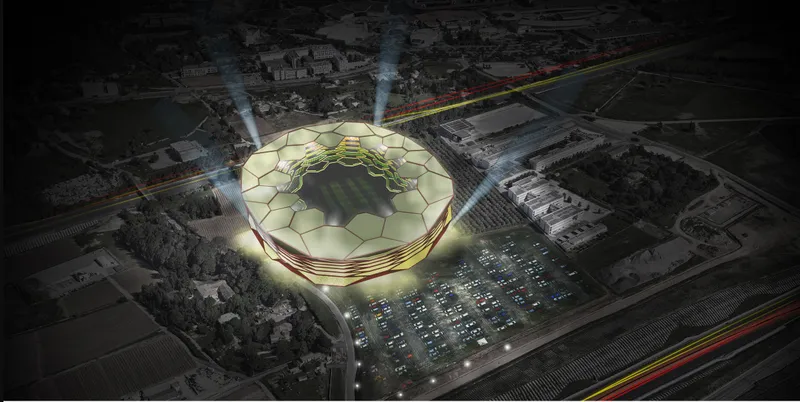Aerial night rendering of the illuminated circular stadium form with faceted facade and surrounding parking lots