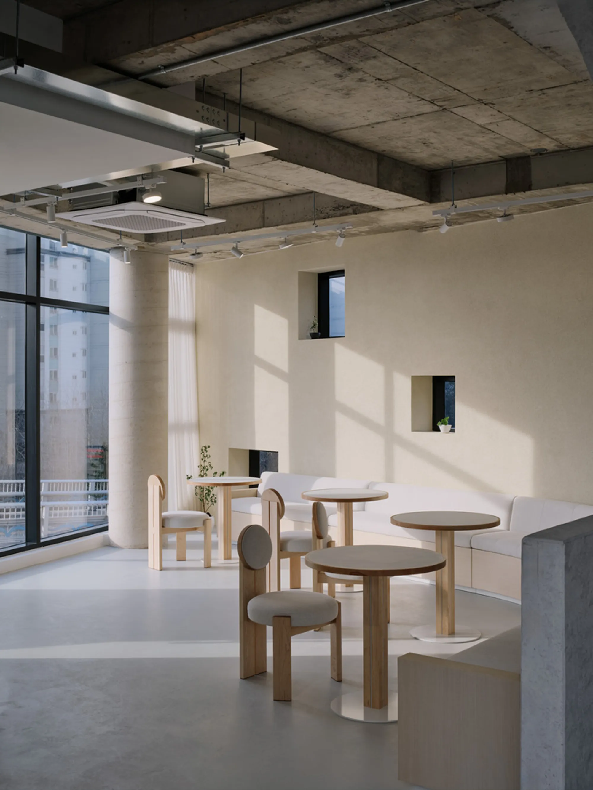 KKOL Studio Threads Maple and Concrete Through a Four-Story Fruit Café in Andong