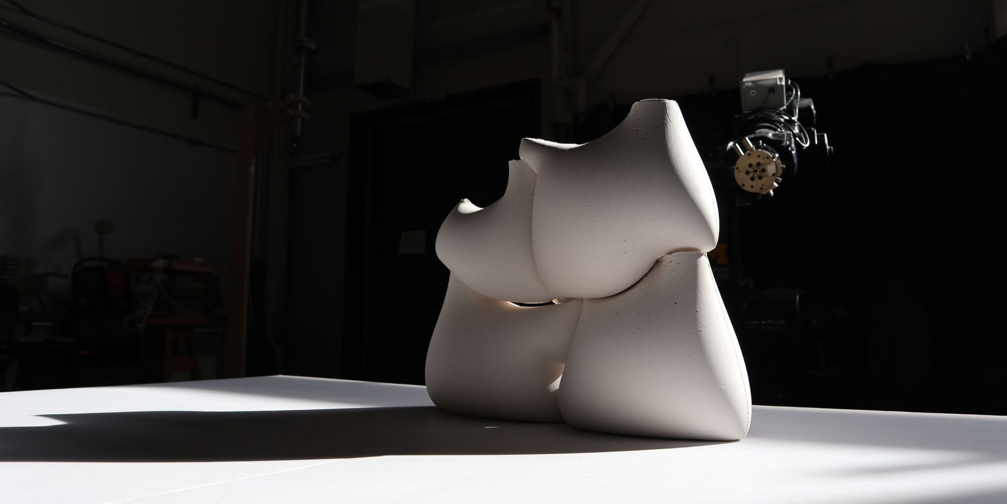 Precise Imprecision: Where Robotic Arms Meet Fabric Molds