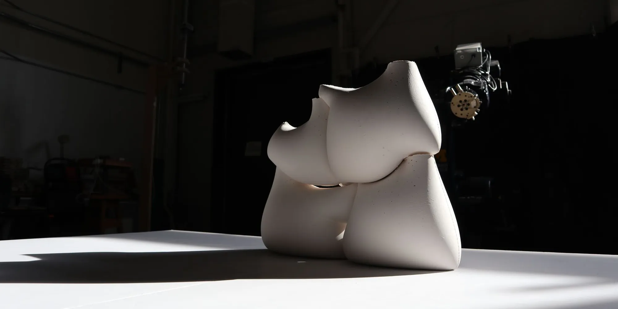 Precise Imprecision: Where Robotic Arms Meet Fabric Molds