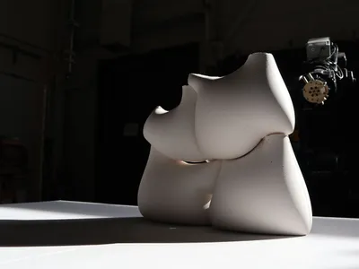 Precise Imprecision: Where Robotic Arms Meet Fabric Molds