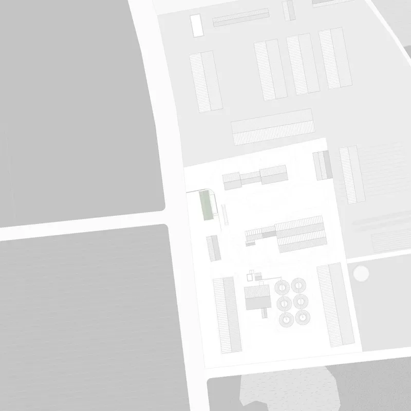 Site plan drawing showing a rectangular courtyard with circular tree plantings and adjacent landscape areas
