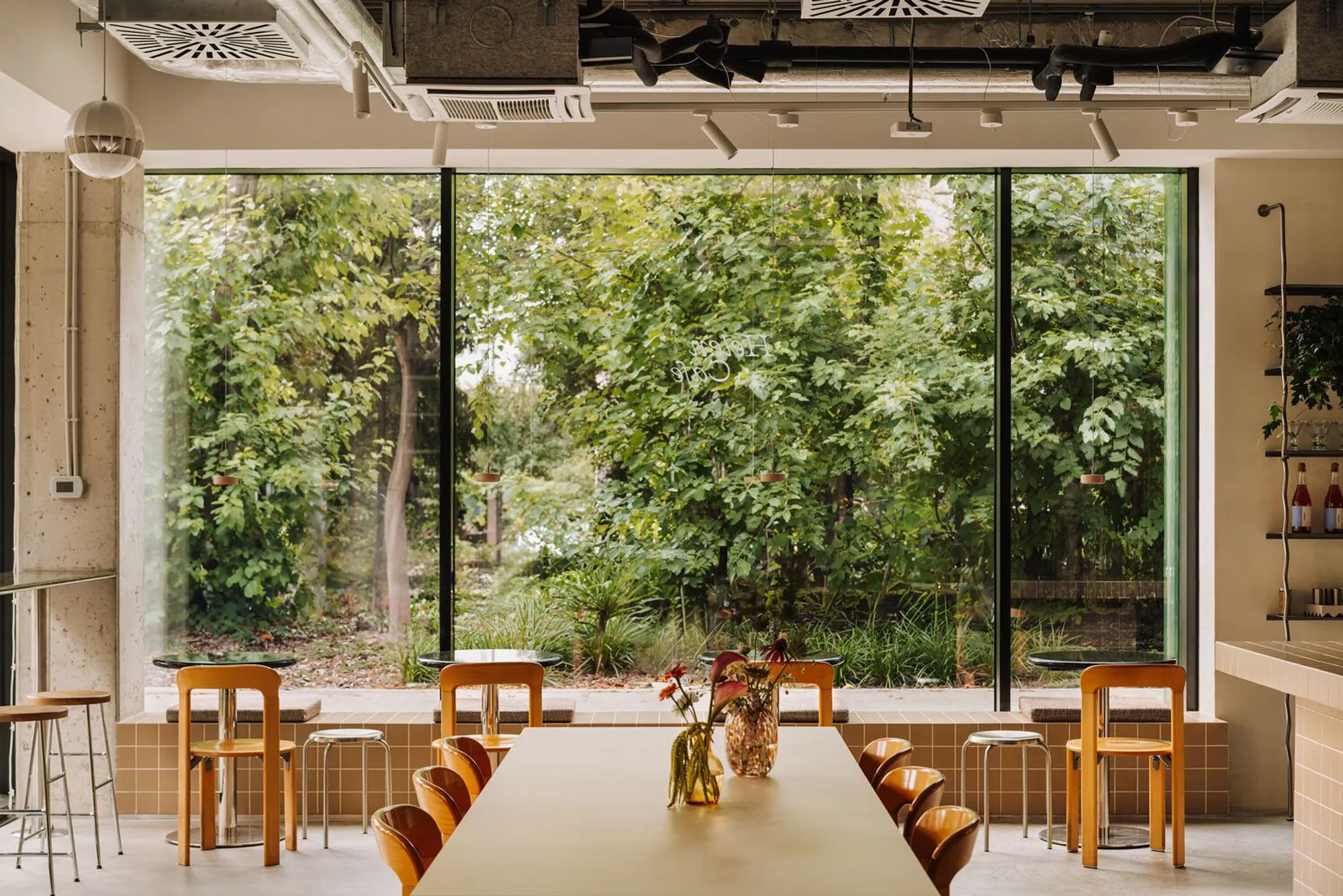 CUDO Fuses a Florist and a Café into One Adaptable Interior in Wrocław's Borek District