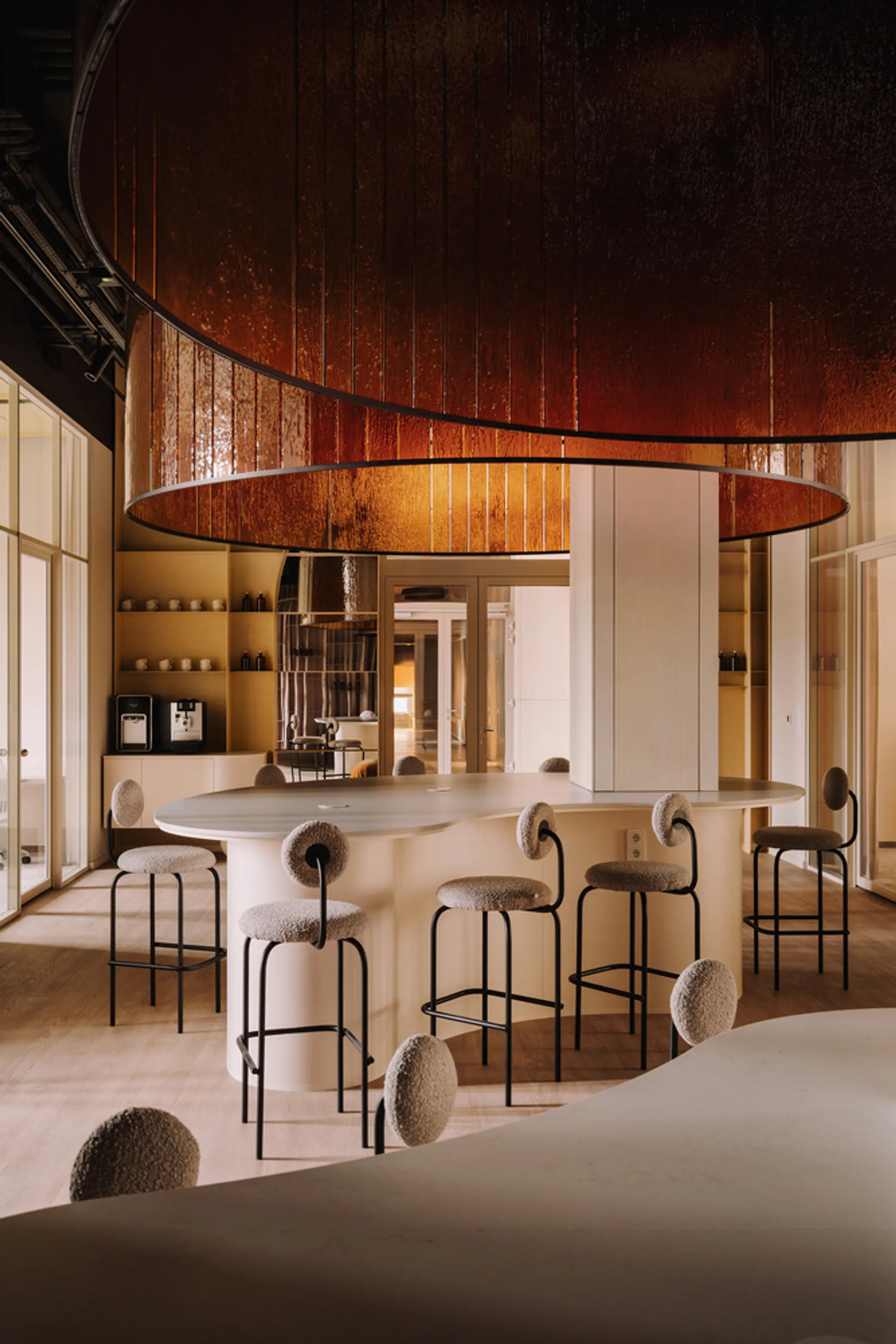 CUDO Turns a Former Pharmacy Building in Wrocław into a Coworking Space Shaped by Glass and River