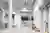This architectural image showcases the interior of a modern warehouse, characterized by its spacious