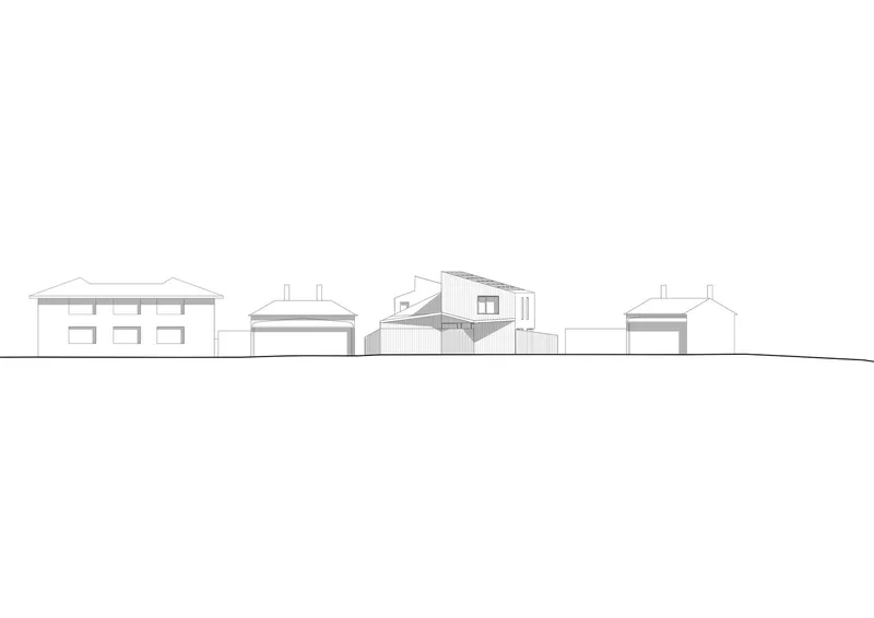 Elevation drawing showing a cluster of residential structures along a sloped ground line