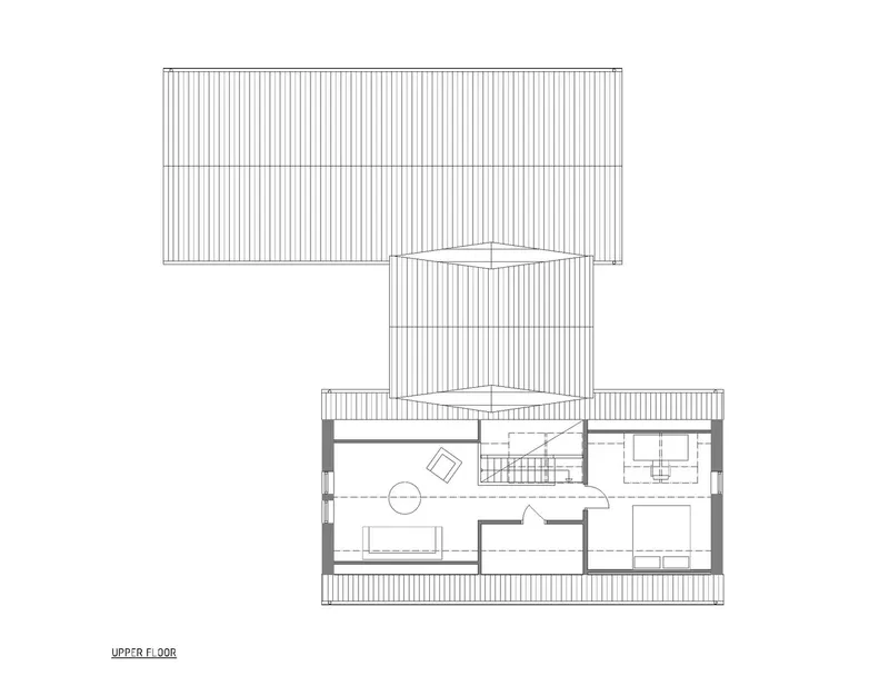 Upper floor plan drawing with pitched roof outlined above sleeping quarters and central stairwell