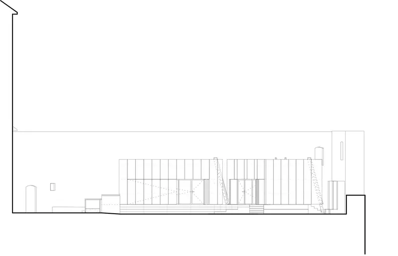 Section drawing depicting interior partition walls with vertical slat screens and ceiling detail