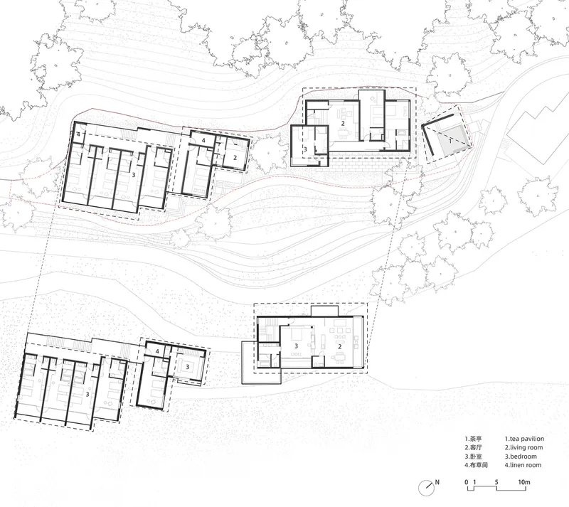 Floor plan drawing depicting two separate building clusters separated by sloping topography lines