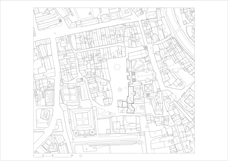 Site plan drawing showing street layout and building footprints in an urban block