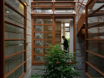 Tad.atelier Builds a 90 m² Breathing House Near a Vietnamese Industrial Zone