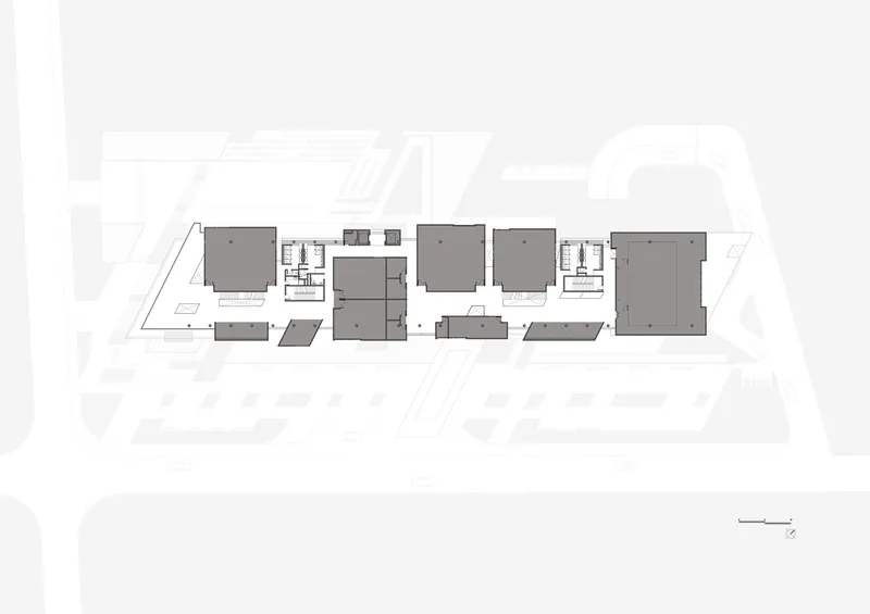 Upper floor plan drawing indicating the arrangement of interior spaces within the grouped building volumes