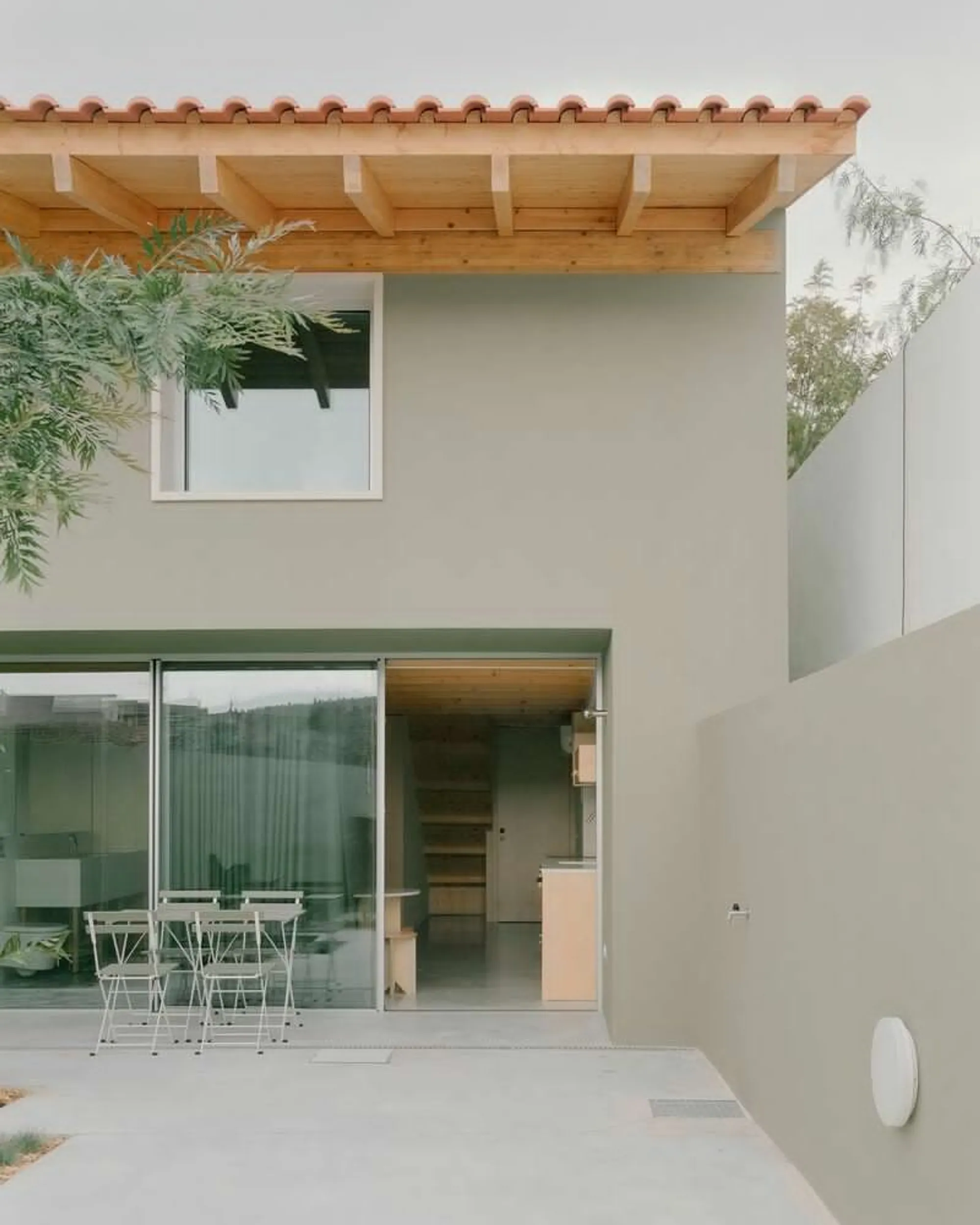 Bruno Dias Arquitectura Splits an Old Ansião Building into Two Timber-Lined Apartments