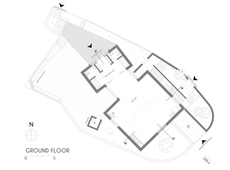 Ground floor plan drawing showing an irregular perimeter with rooms arranged around a central hall and corner terrace