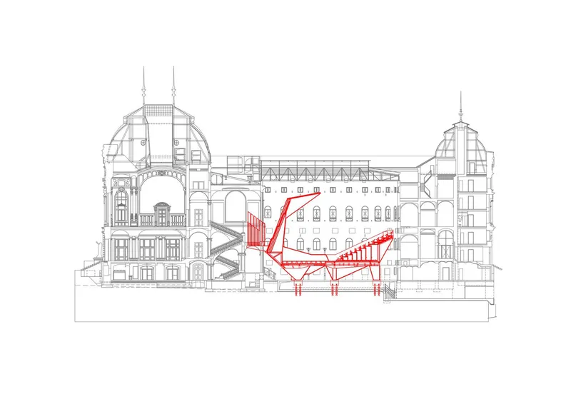 Section drawing showing the cantilevered auditorium structure in red within the historic masonry shell
