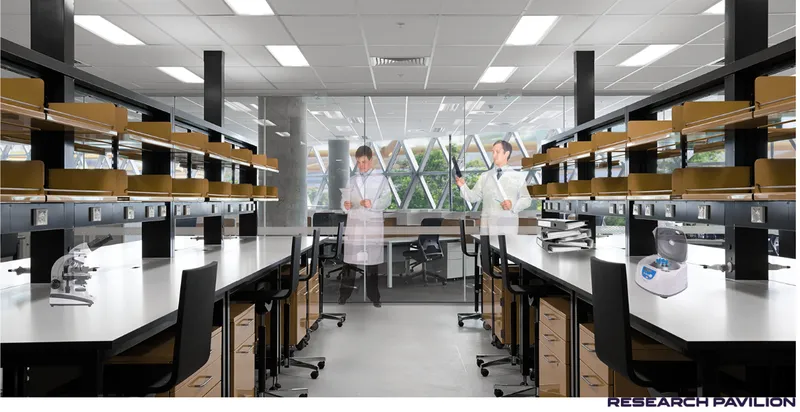 Laboratory interior with white benches, black shelving, microscopes, and researchers in white coats under suspended ceiling panels