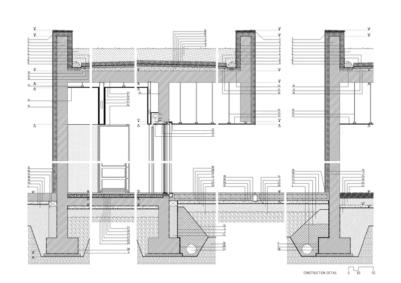 Construction detail drawing showing wall assemblies, foundation connections, and material layers in section