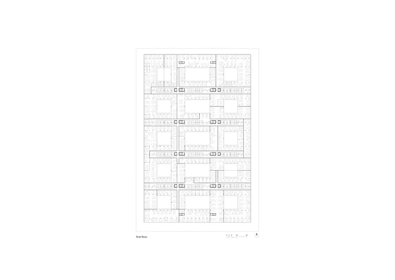 First floor plan drawing showing repetitive office spaces arranged around central circulation cores