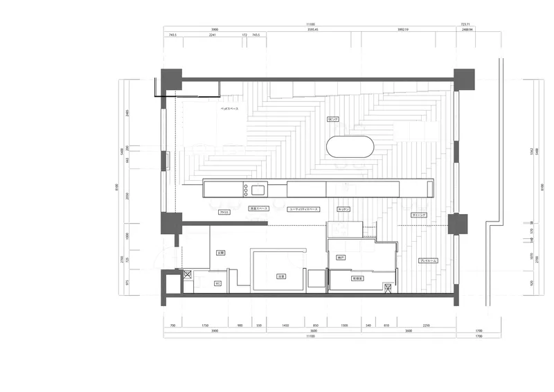 Floor plan drawing showing open kitchen with island and adjacent bathroom and storage zones