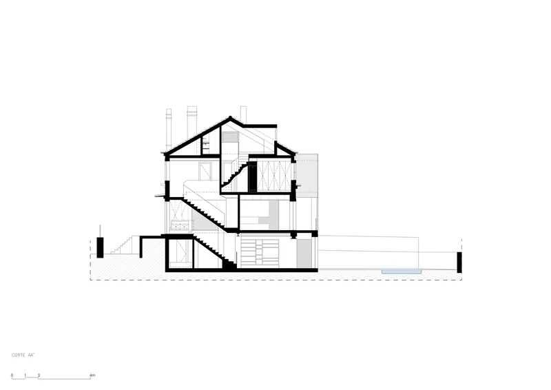 Section drawing revealing split-level interior spaces with staircases connecting multiple floors