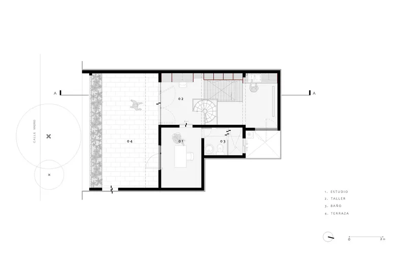 Floor plan drawing showing a studio space with spiral stair and terrace