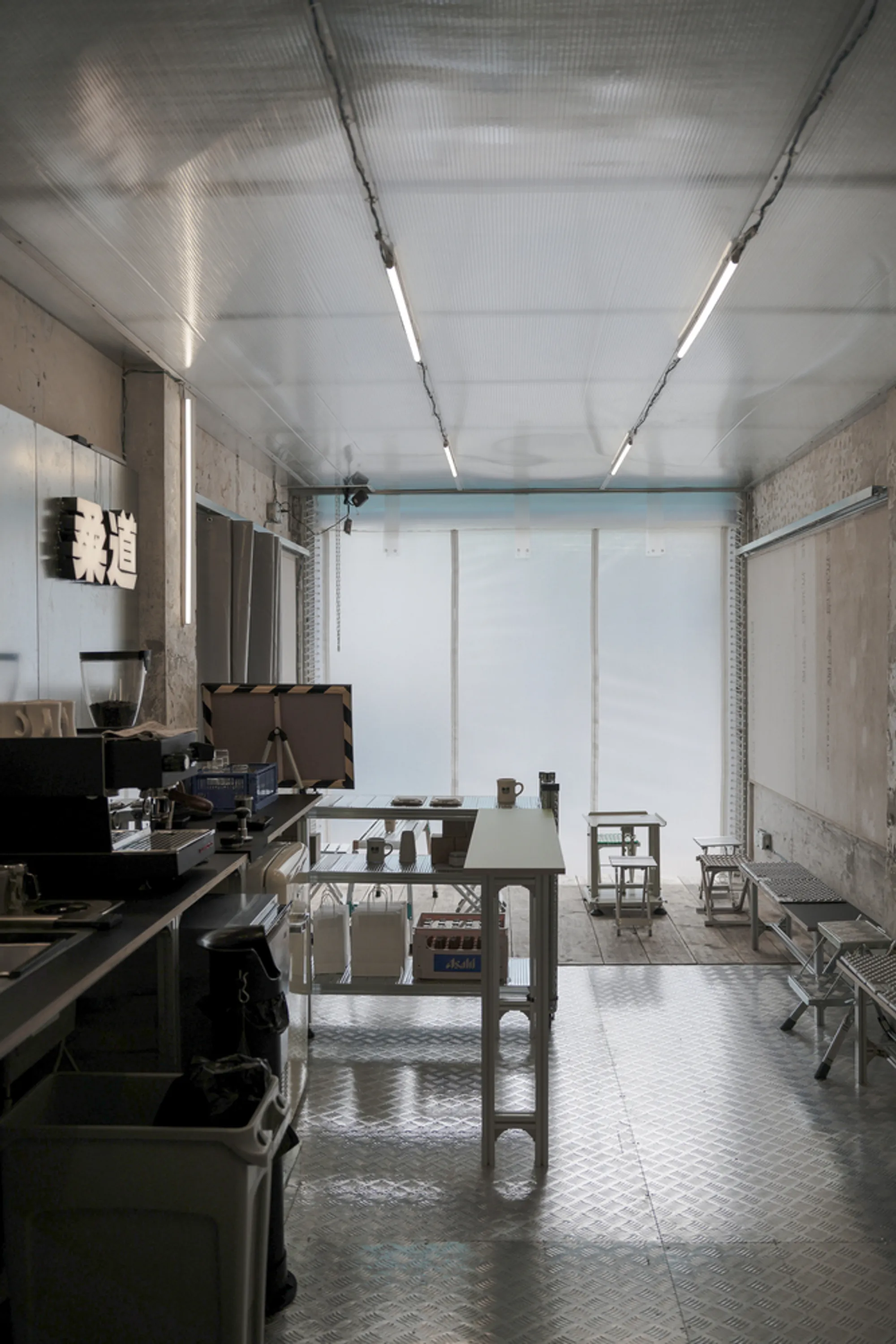 Nhoow Architects Builds a 26-Square-Meter Coffee Dojo from Construction Site Salvage in Chengdu
