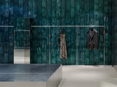 Studio Tama Wraps a Pangyo Fashion Store in Chameleon Wood and Chrome