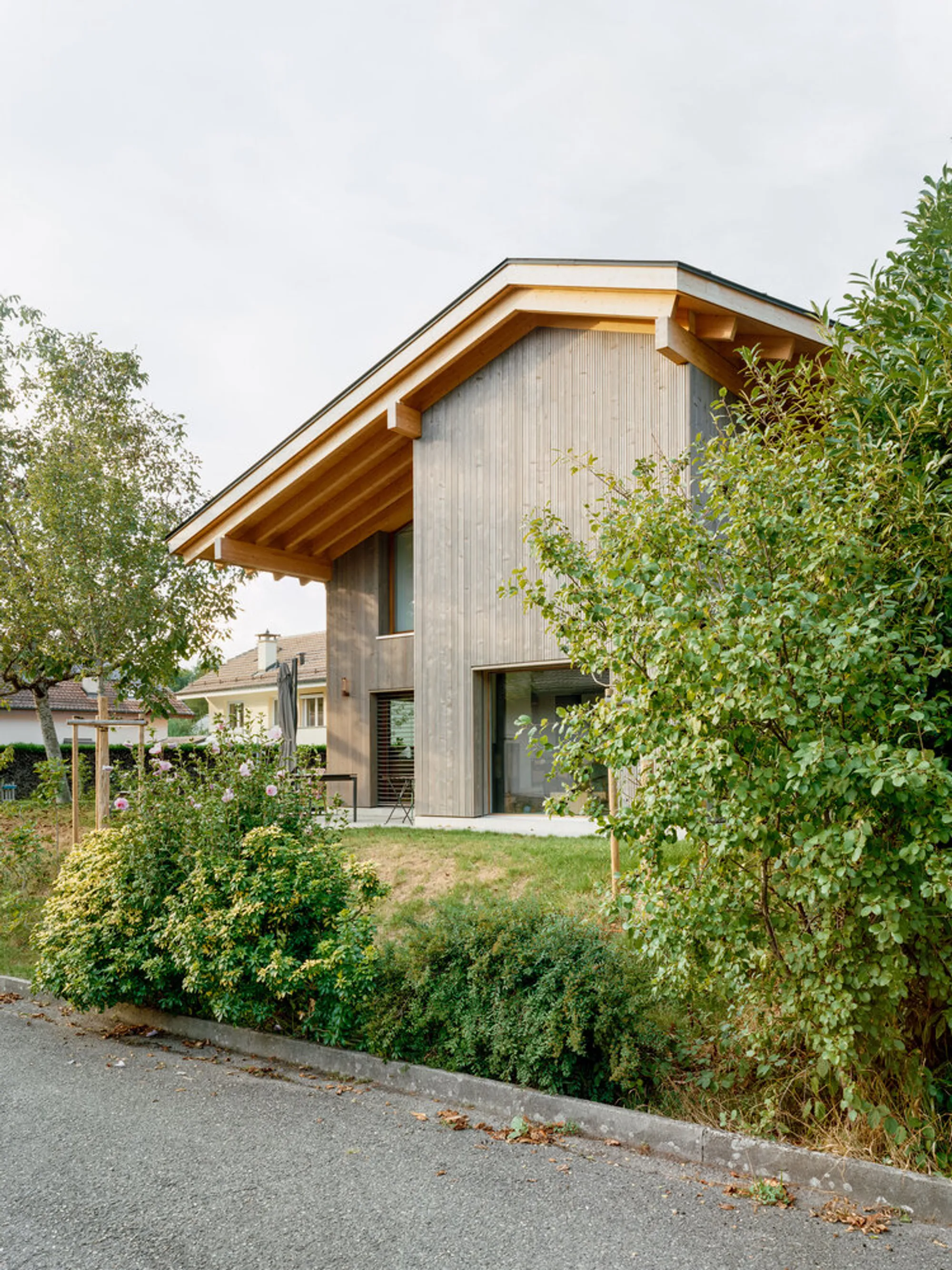 Lacroix Chessex Shelters a Fragmented Timber Villa Beneath One Bold Gable in Veyrier