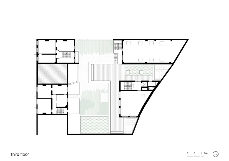 Third floor plan drawing showing terraces, interior rooms, and rooftop areas with varied surface treatments