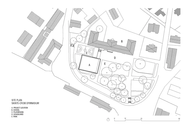 Site plan drawing showing the building footprints and surrounding streets with landscape elements