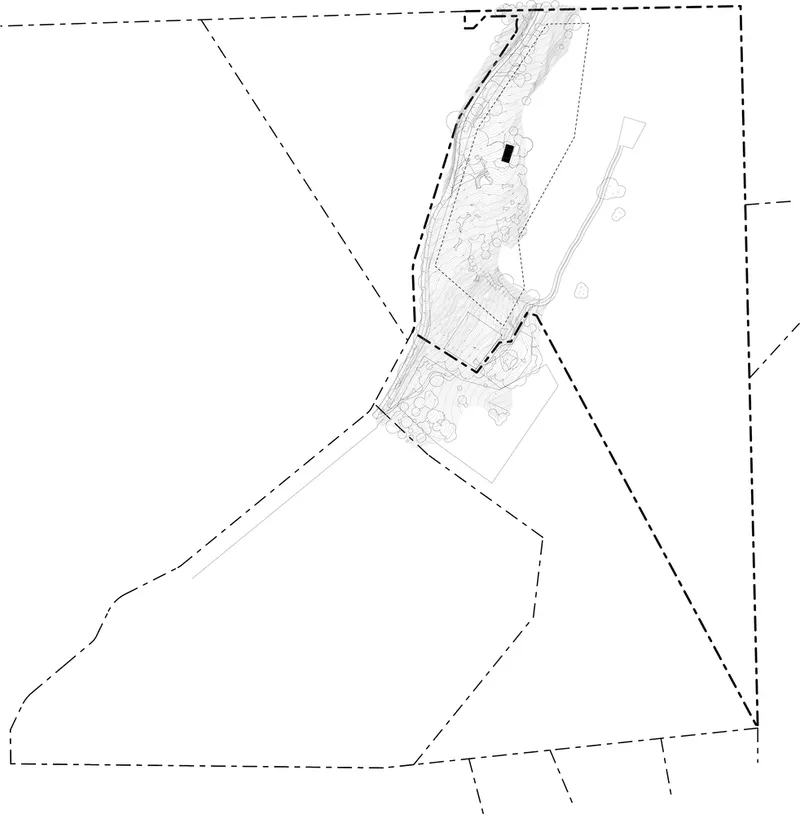 Site plan drawing showing the building footprint nestled within contour lines and vegetation