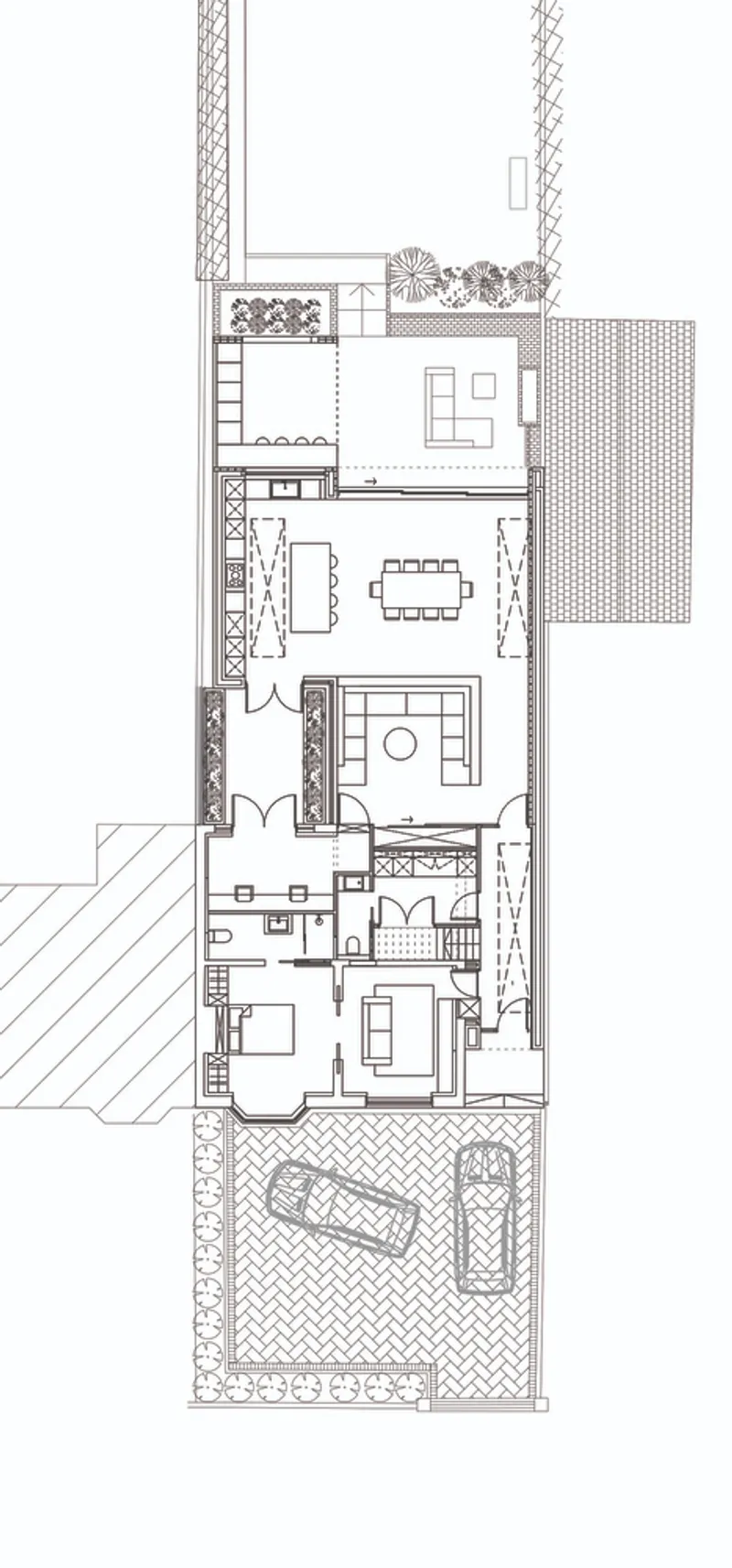 Floor plan drawing showing linear arrangement of rooms with central courtyard and exterior terrace