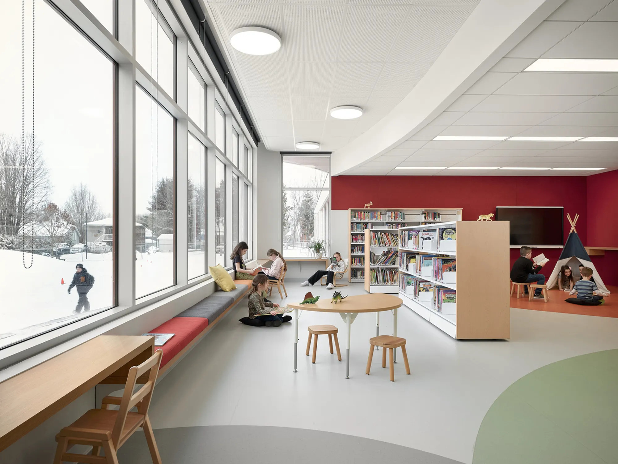 STGM and Ateliers Architecture Wrap a 1959 Québec School in Curves and Clay Brick
