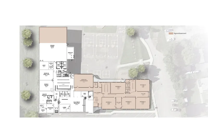 Floor plan drawing showing L-shaped school layout with courtyard and adjacent parking area