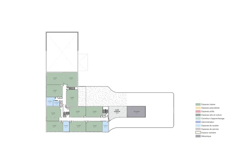 Ground floor plan drawing showing L-shaped classroom wing with central courtyard and exterior open space