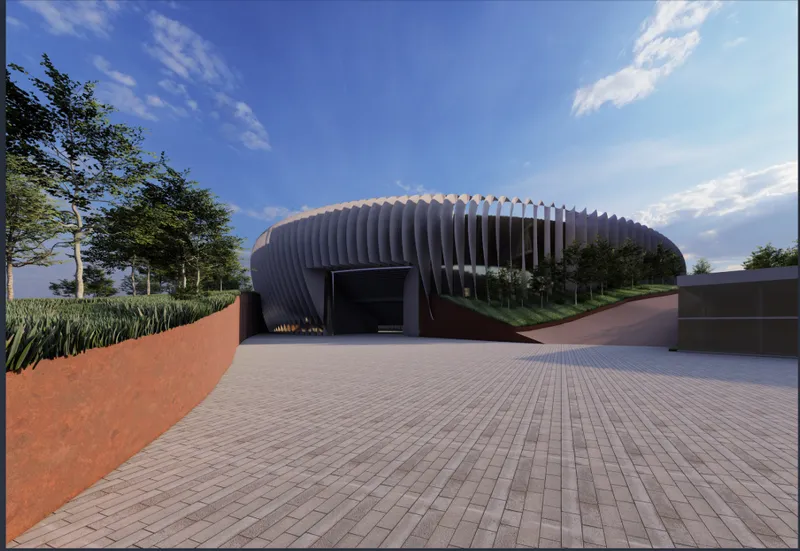 Entry plaza showing the stadium entrance beneath the vertical ribbed facade and paved forecourt under blue sky