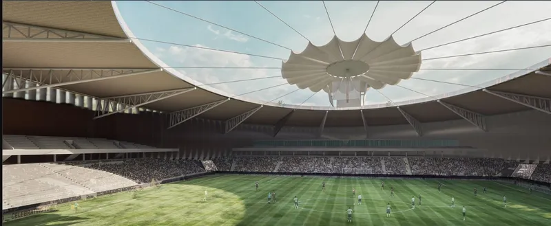 Interior view of the stadium bowl showing the radial cable roof suspended above the playing field and seating tiers
