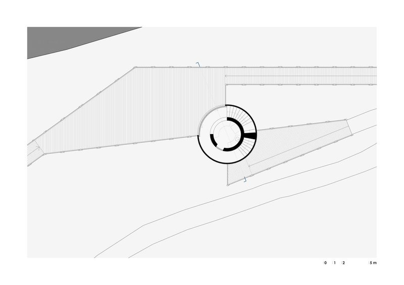 Floor plan drawing showing a circular core adjacent to triangular volumes and a linear walkway