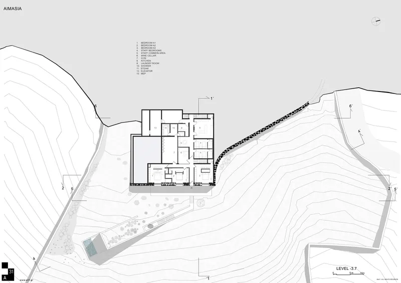 Floor plan drawing showing rectangular volumes with interior rooms arranged around a central courtyard on sloping site