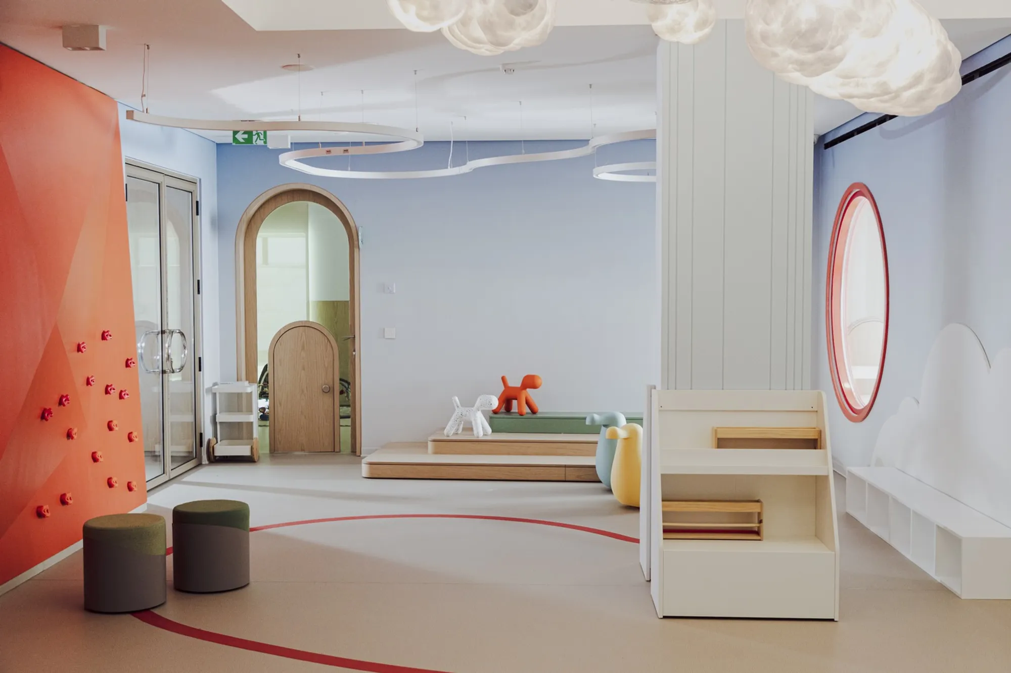 Paradigm Design House Wraps an Amman Nursery in Orange Curves and Color Psychology